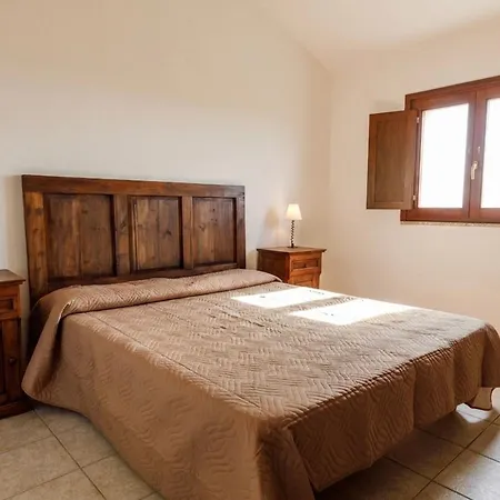 Isa - With Common Swimming-pool And Outdoor Private Area In Badesi