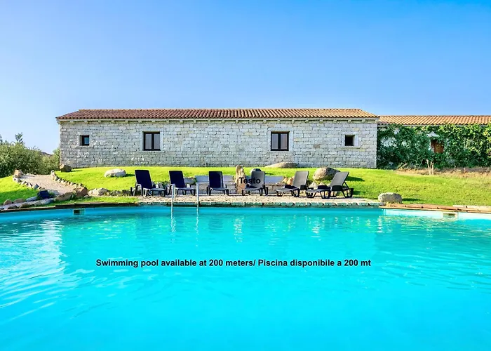 Isa - With Common Swimming-pool And Outdoor Private Area In Badesi